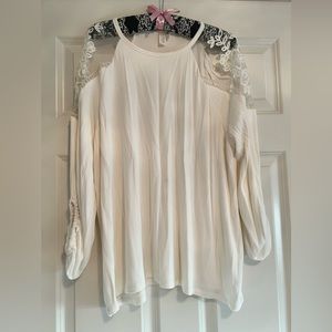 Cream top with lace at the shoulders